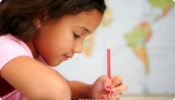 child focused on writing